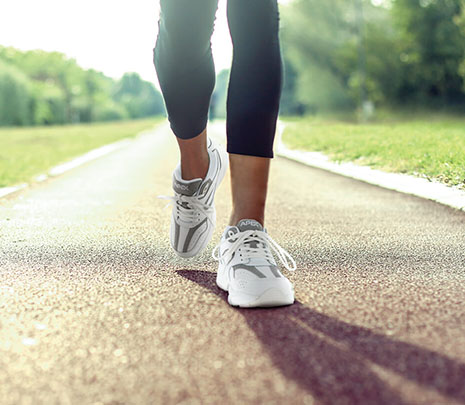 Women walking wearing Apex Sneakers
