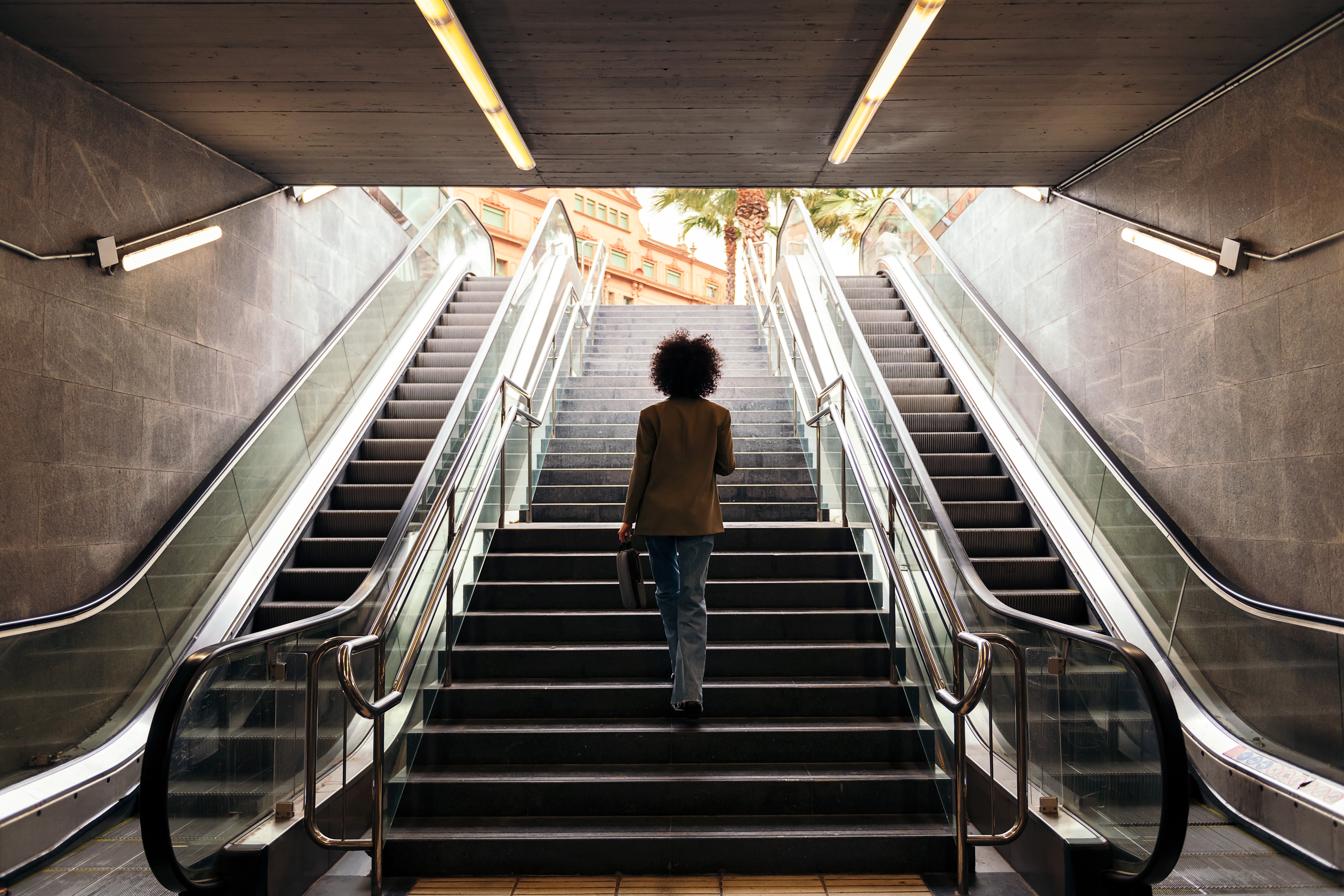 Woman walking up stairs
