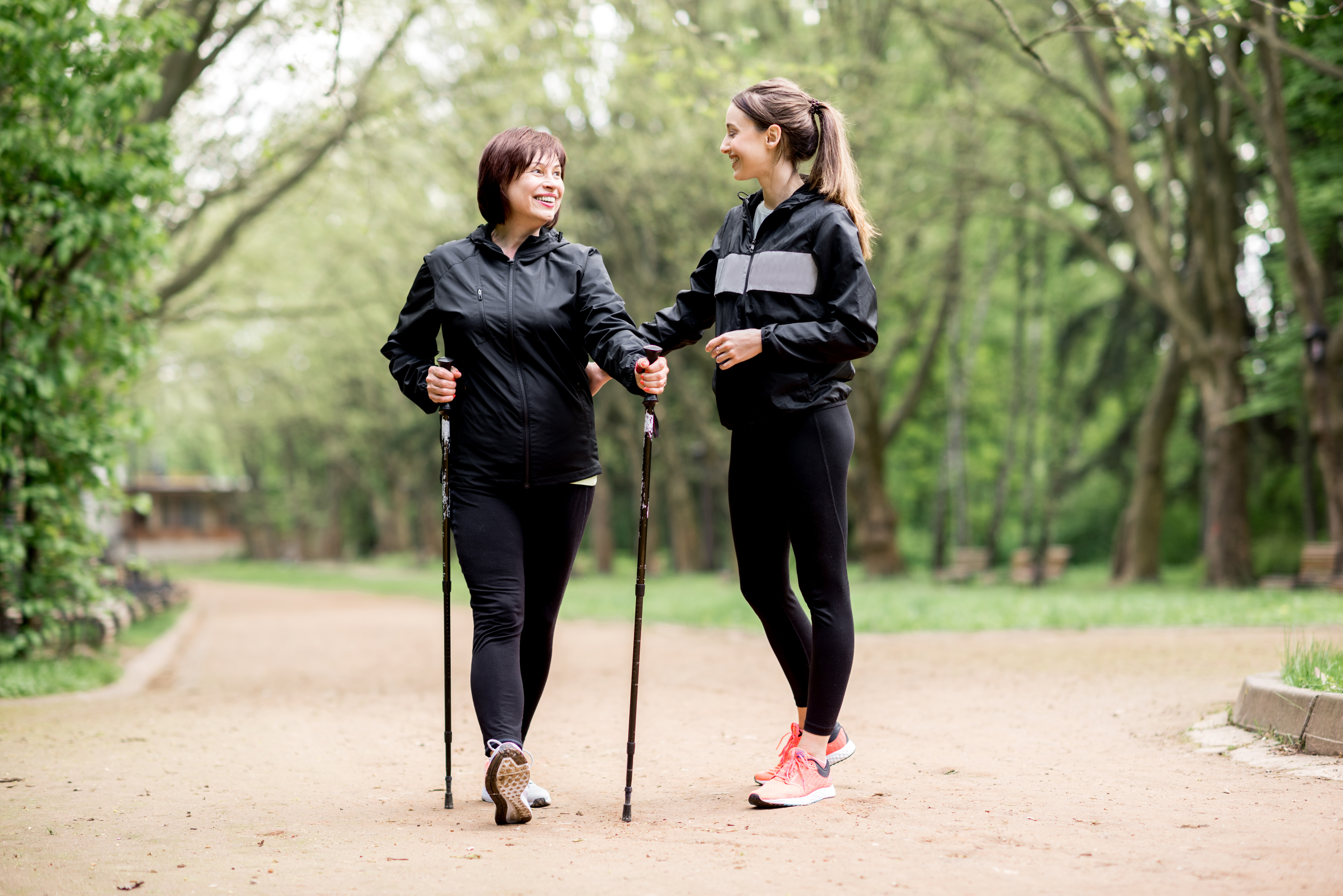 Two women walking outside together