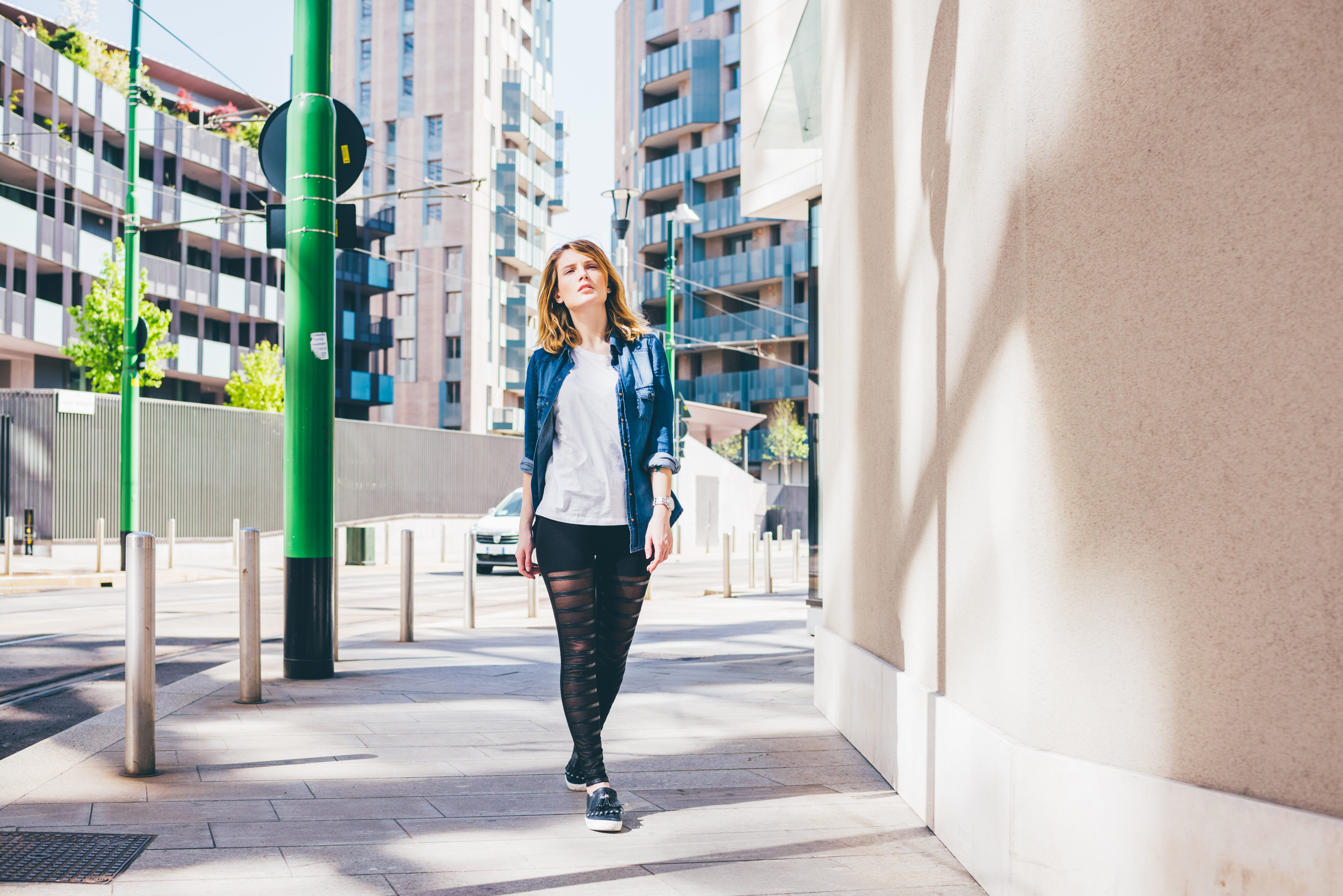 Woman walking down street