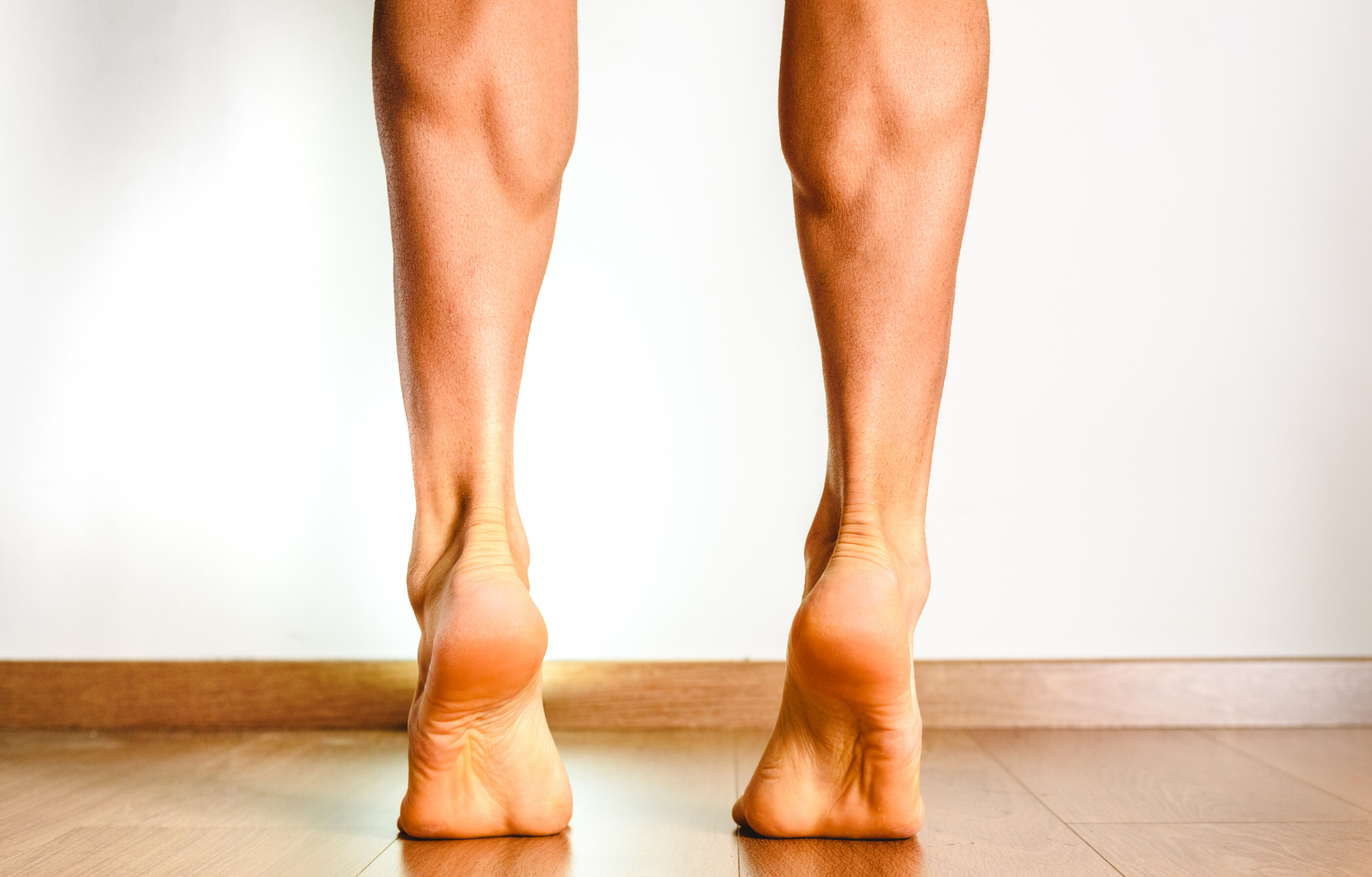 Close up of person on tip toes stretching