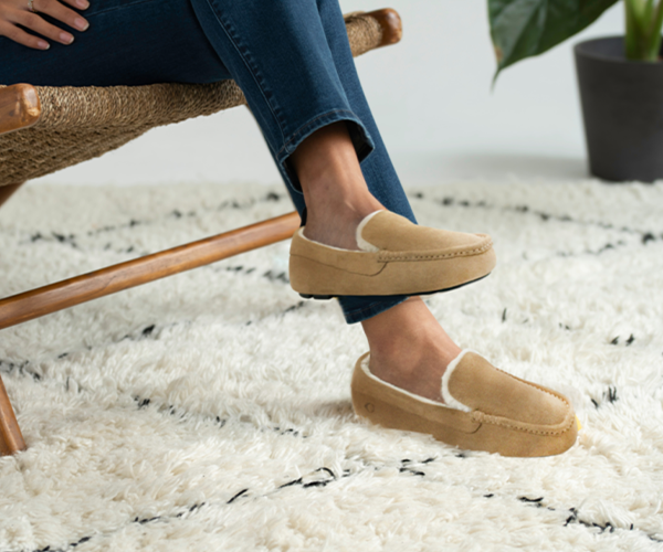 Closeup of woman wearing Unisex Orthopedic Moccasin Slipper Camel